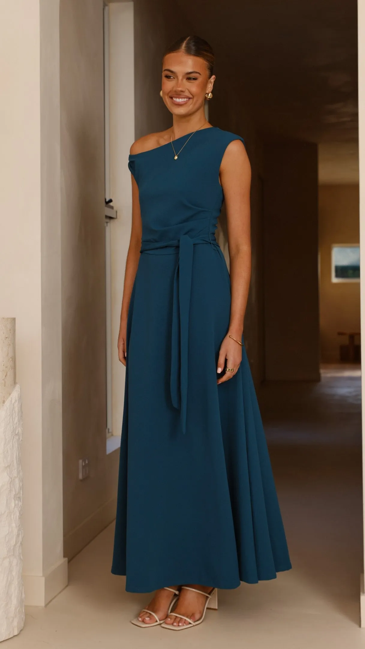 This dress offers a flattering shape that can easily be accessorized for a variety of looks Gemma Maxi Dress - Teal