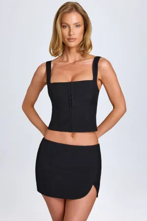 Curved Low-Rise Mini Skirt in Black Bold Finish Non Irritating Seams