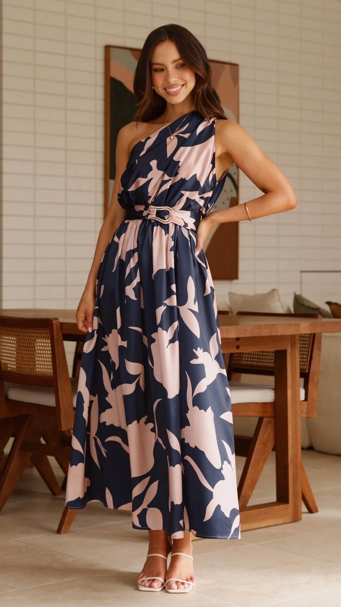 This dress is designed to highlight your natural figure while providing ultimate comfort Tassel Glow Hadas Maxi Dress - Navy/Pink Print