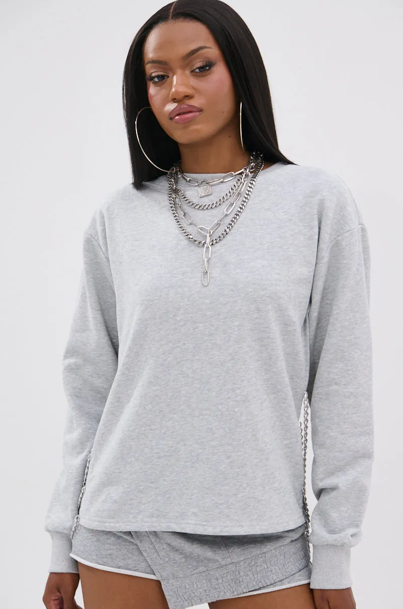 OPEN BACK CHAIN DETAIL SWEATSHIRT IN GREY Brand Identity