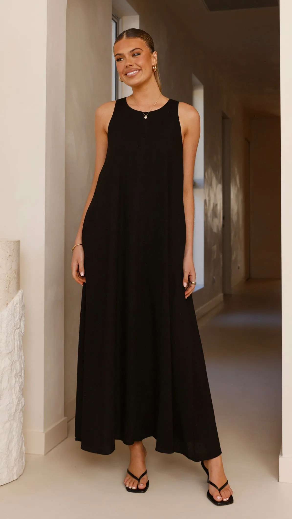 Sunbeam Flow Perfect for layering with jackets or sweaters this maxi dress works for year-round wear Darcy Maxi Dress - Black
