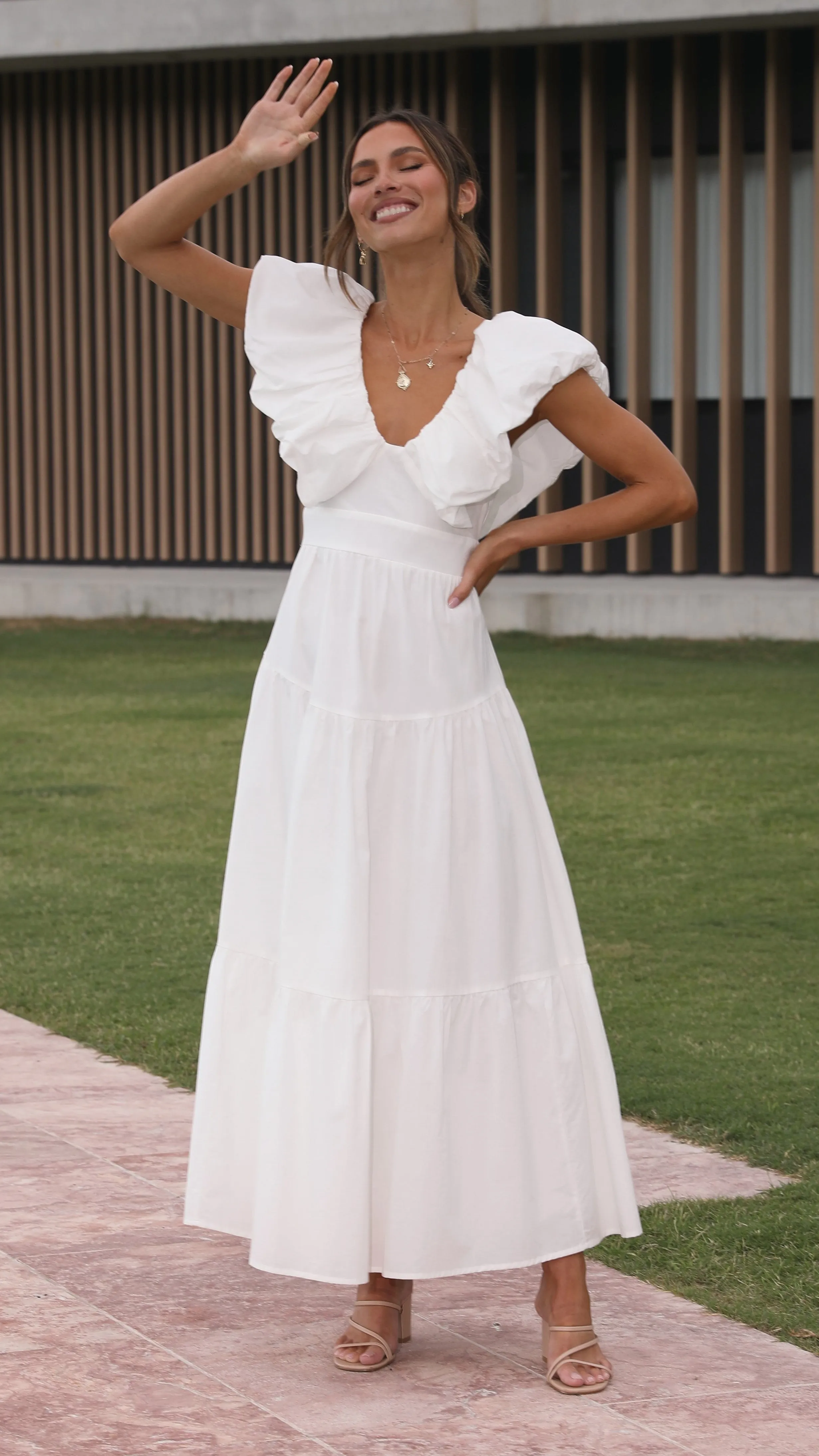 The versatile nature of this maxi dress allows for a range of styling possibilities from casual to chic Emma Maxi Dress - White