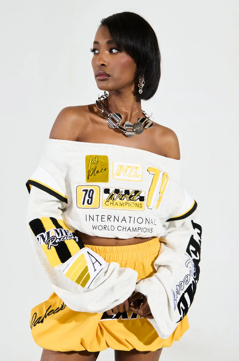 Product improvement RACING THROUGH OFF THE SHOULDER SWEATSHIRT