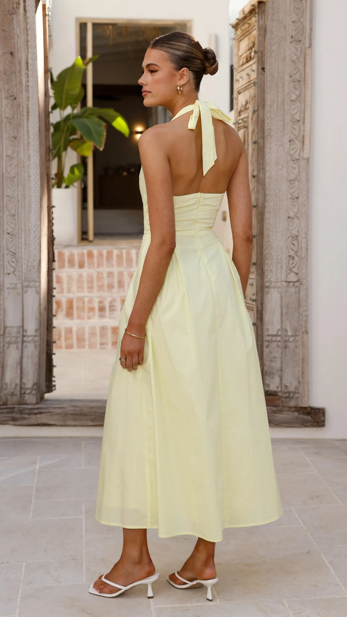 Wesley Halter Neck Maxi Dress - Yellow With its elegant design this maxi dress can be styled for a variety of events from casual to formal