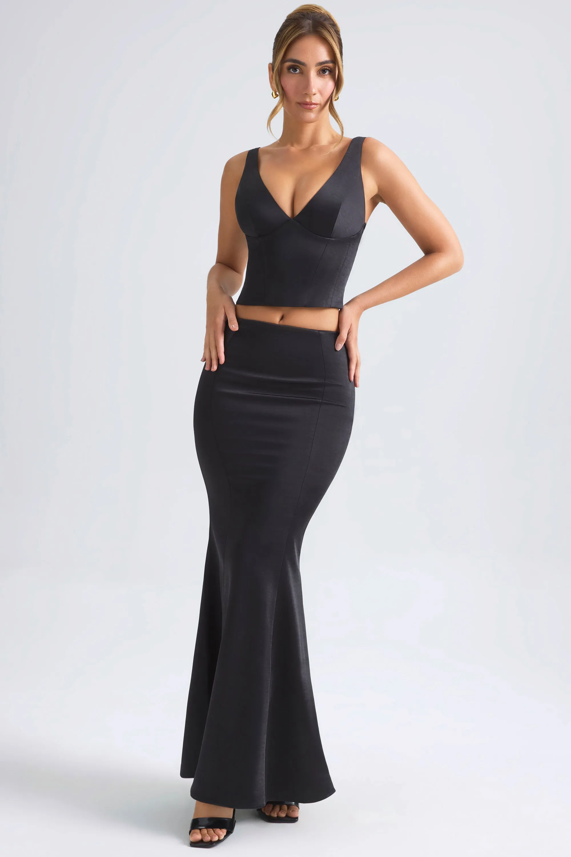 Mid-Rise Fishtail Maxi Skirt in Black Laser Cut Edges