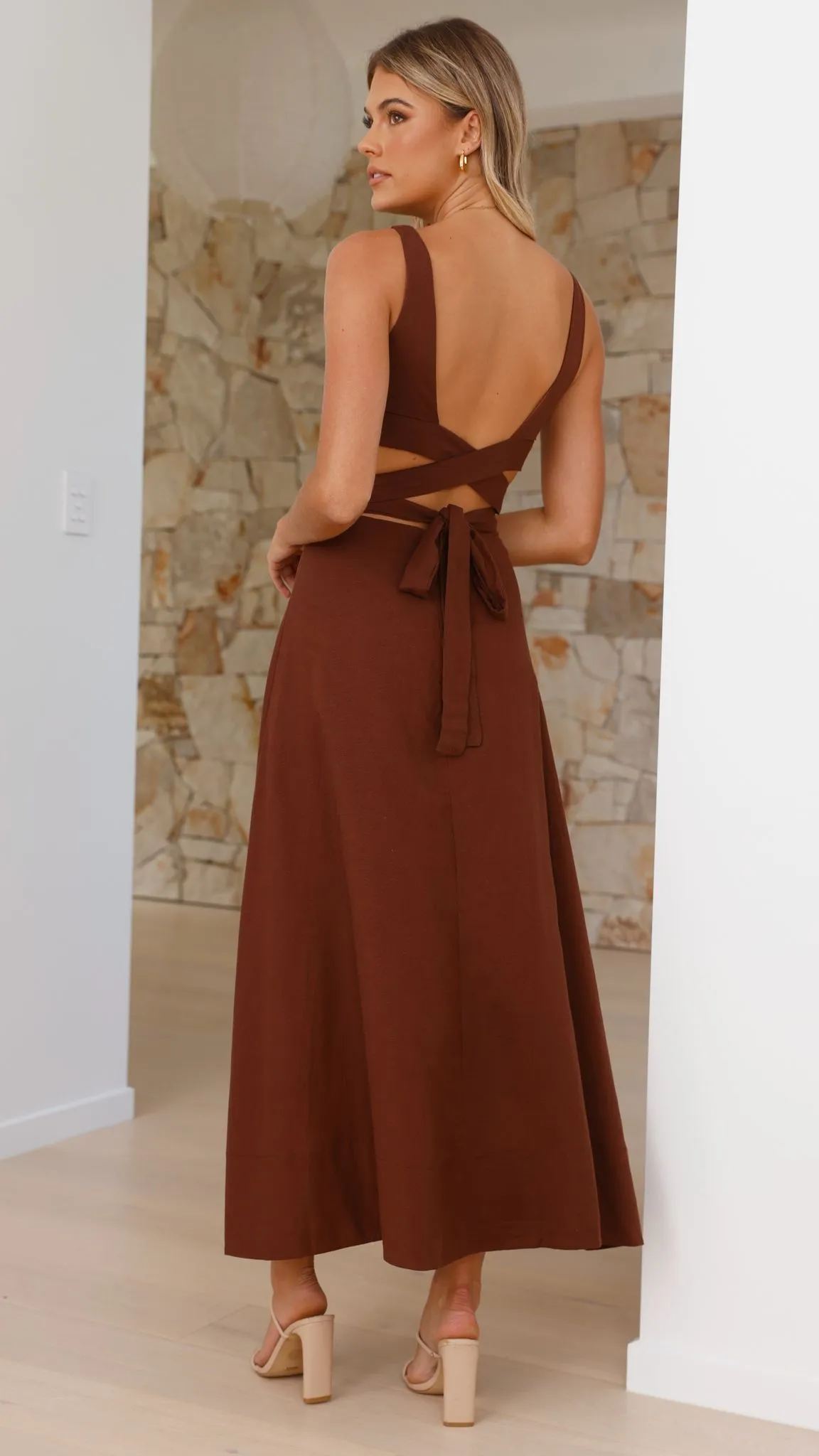 The flattering silhouette of this dress enhances your figure without compromising comfort Stripe Flow Kimberley Maxi Dress - Chocolate
