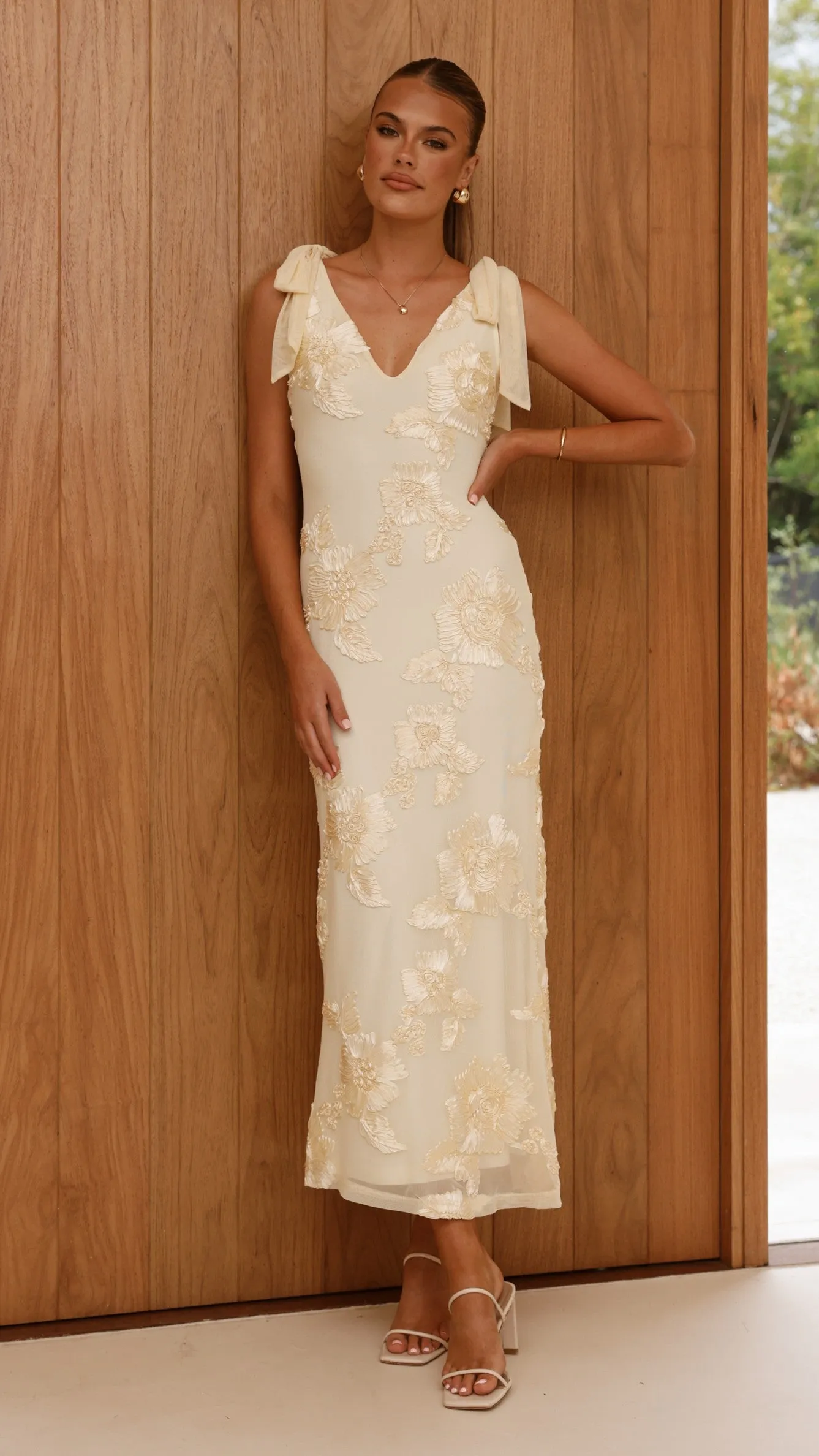 Timeless Glow This maxi dress is perfect for creating a chic and polished look without trying too hard Usha Tie Strap Maxi Dress - Yellow