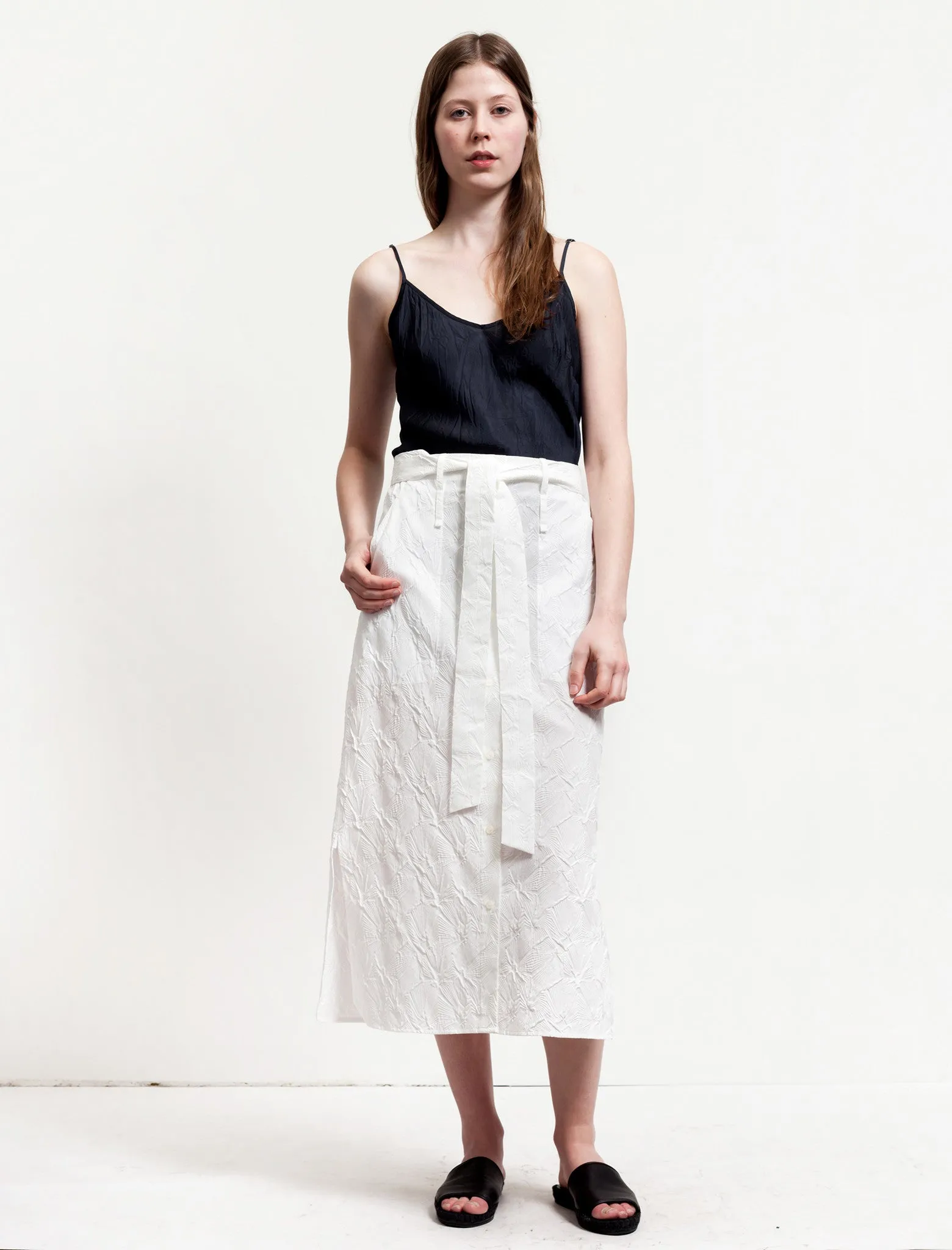 Pleated Construction Tassel accents Long Embossed Skirt White