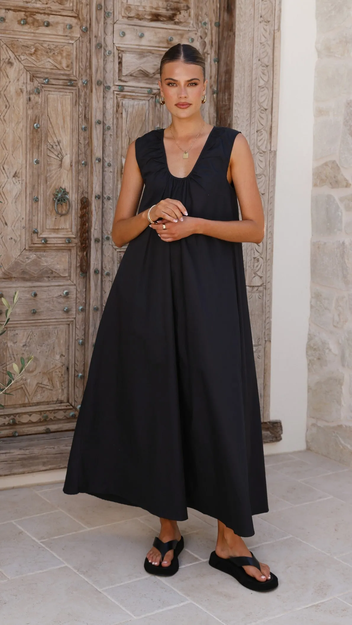 Peony Bloom With its sleek and chic design this dress is perfect for both casual and formal settings Scout Maxi Dress - Black
