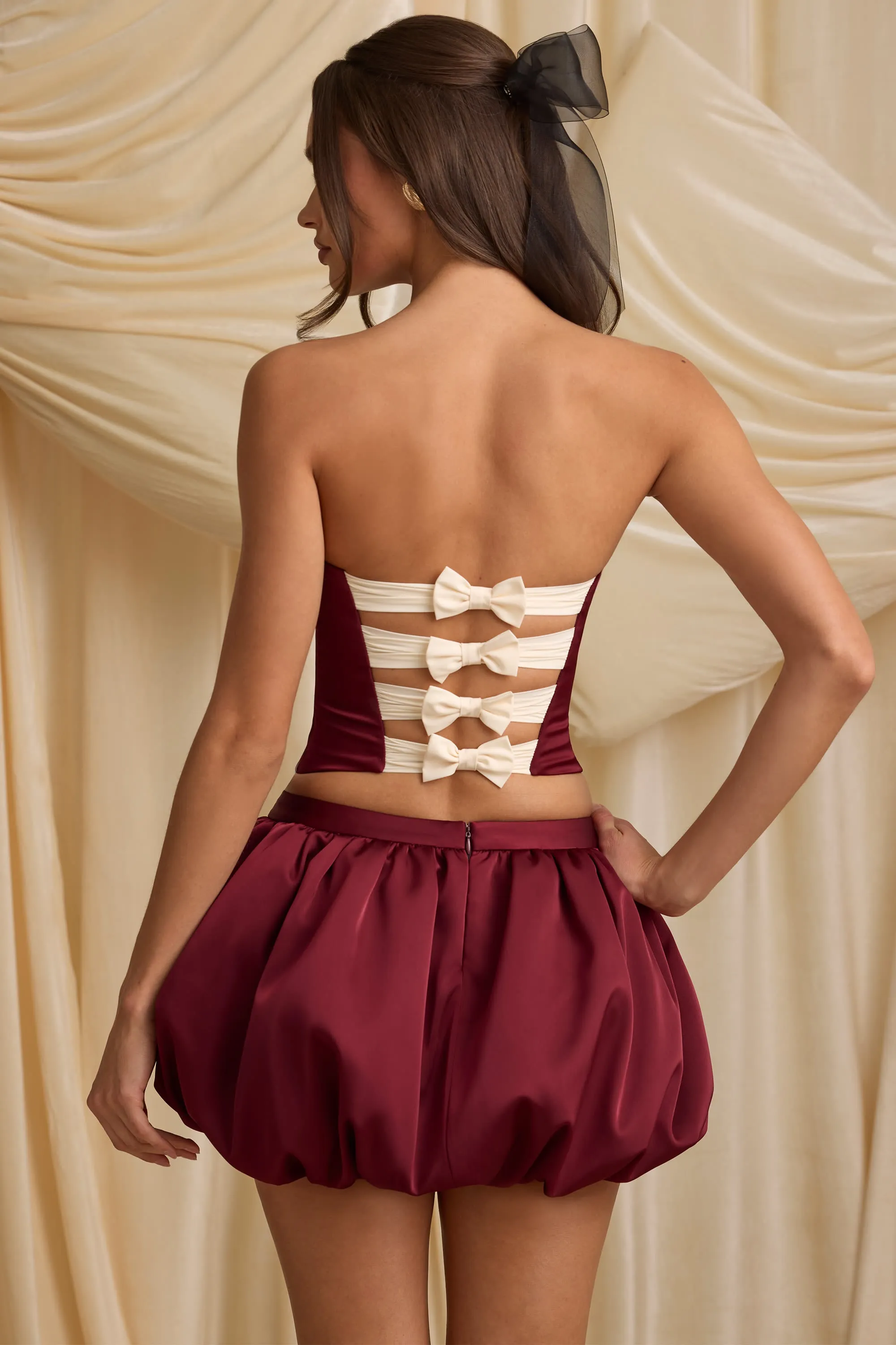 Bubble Hem Mid-Rise Mini Skirt in Wine Red Light Moodboard