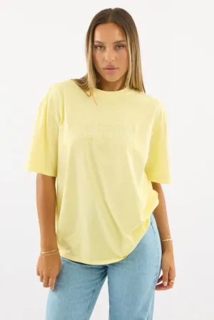 Subtle Logo Placement Fashion Forward Yellow Graphic Tee Short Sleeve
