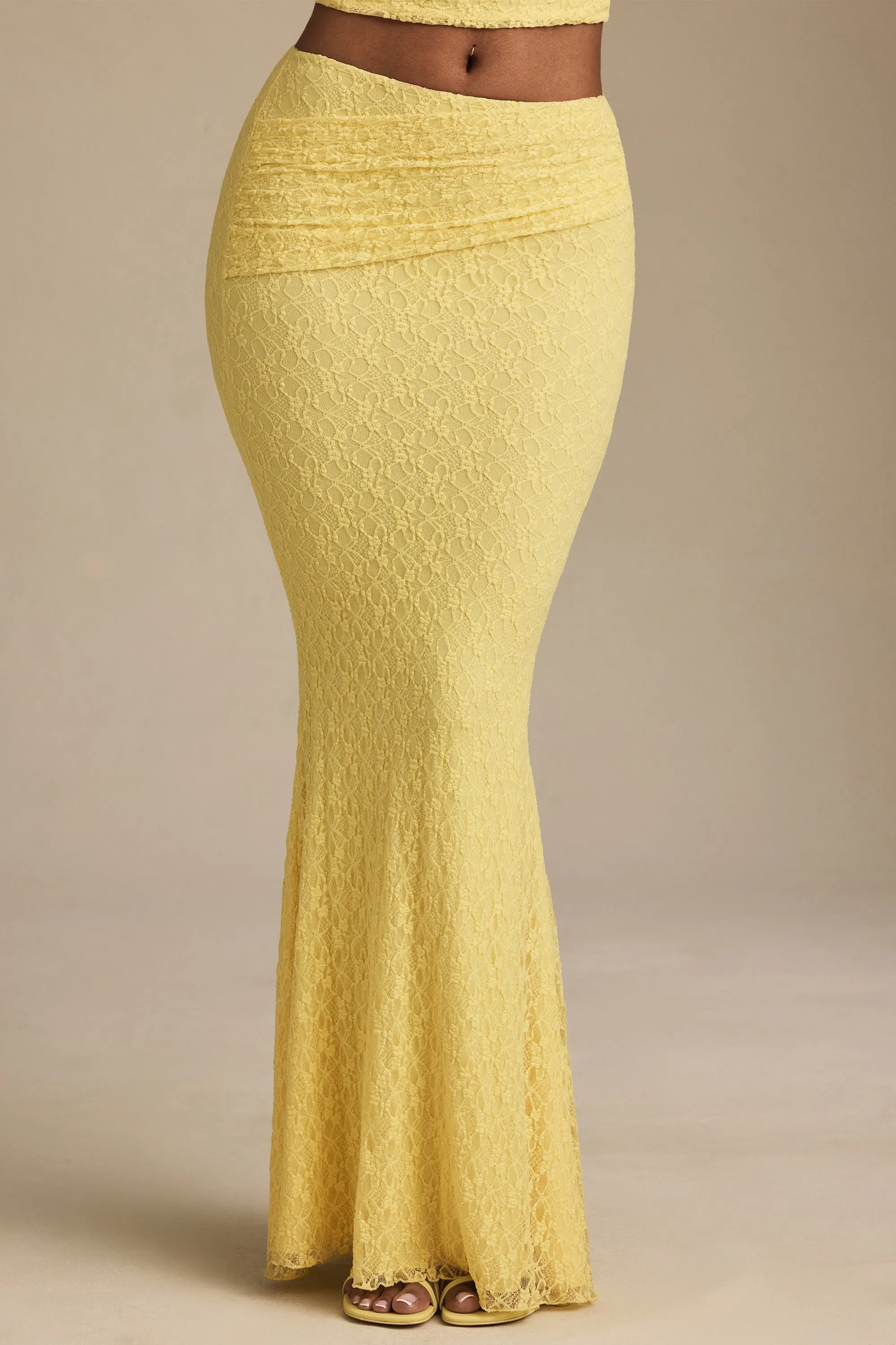 Draped Low-Rise Lace Maxi Skirt in Pastel Yellow lace accents