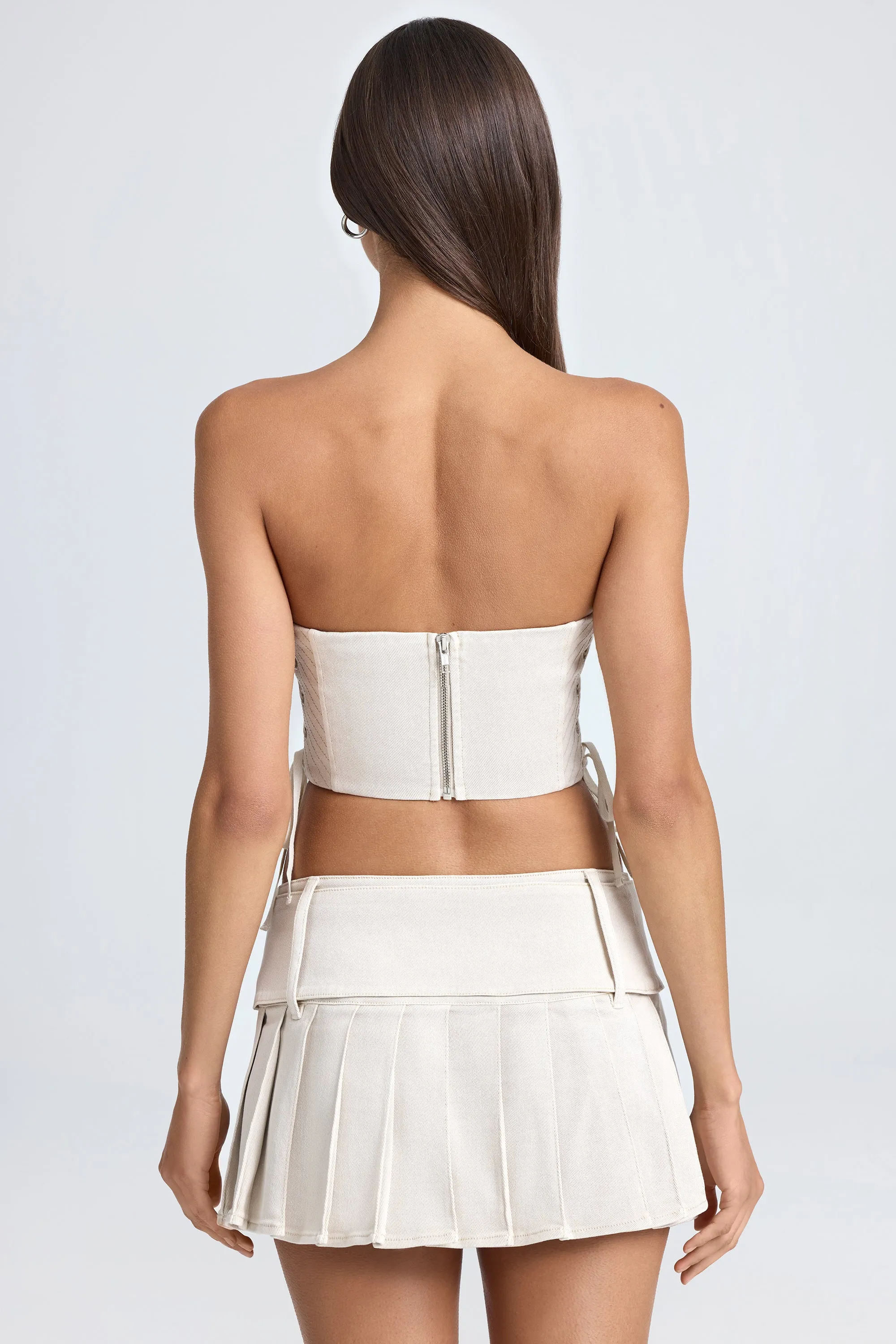 Belted Pleated Low-Rise Micro Mini Skirt in Ecru Slim Fit Band