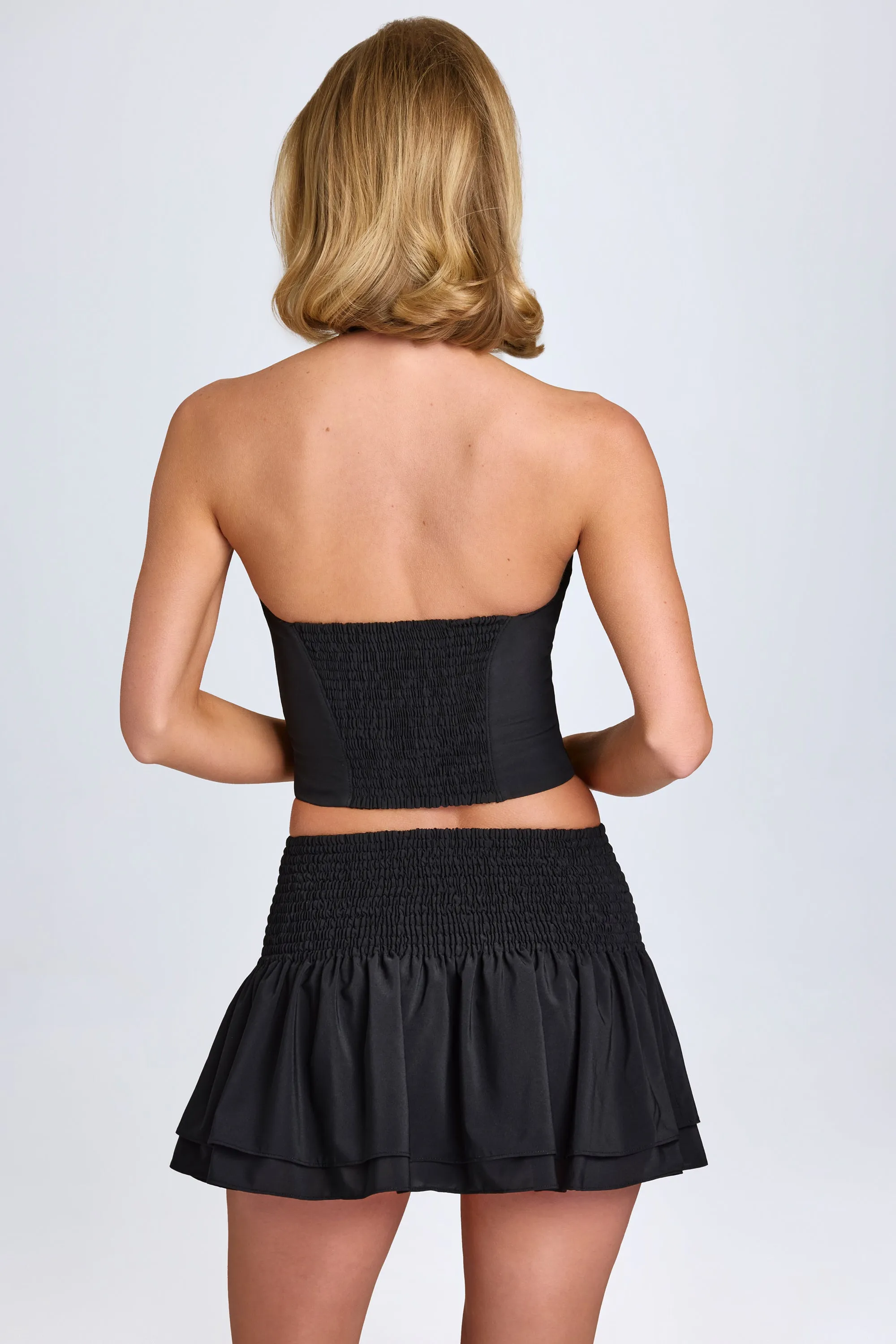 Sleek Styling Ruffled Shirred Low-Rise Micro Mini Skirt in Black