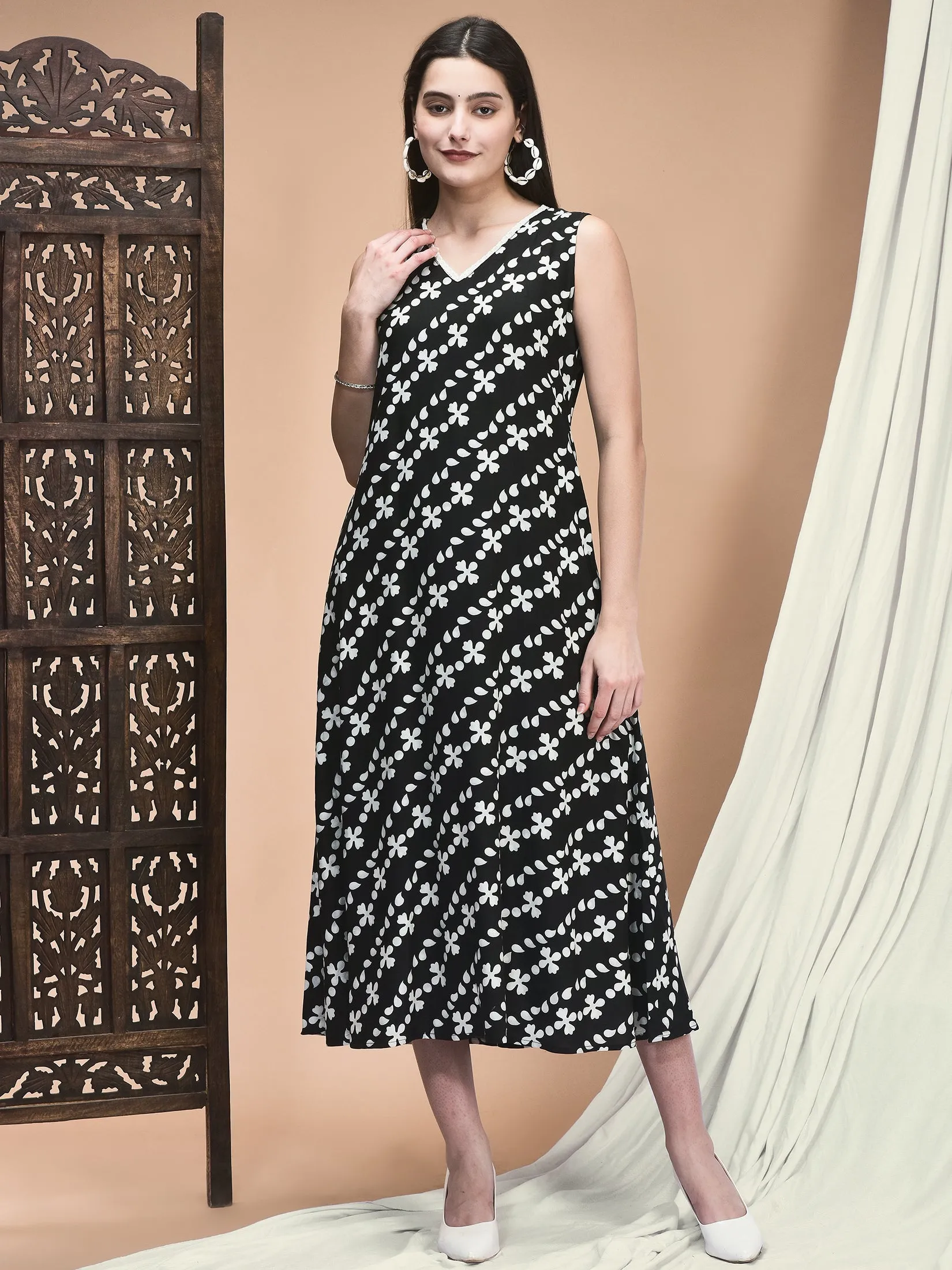 Unique Cut Women Liva Black and White Printed A-line Dress