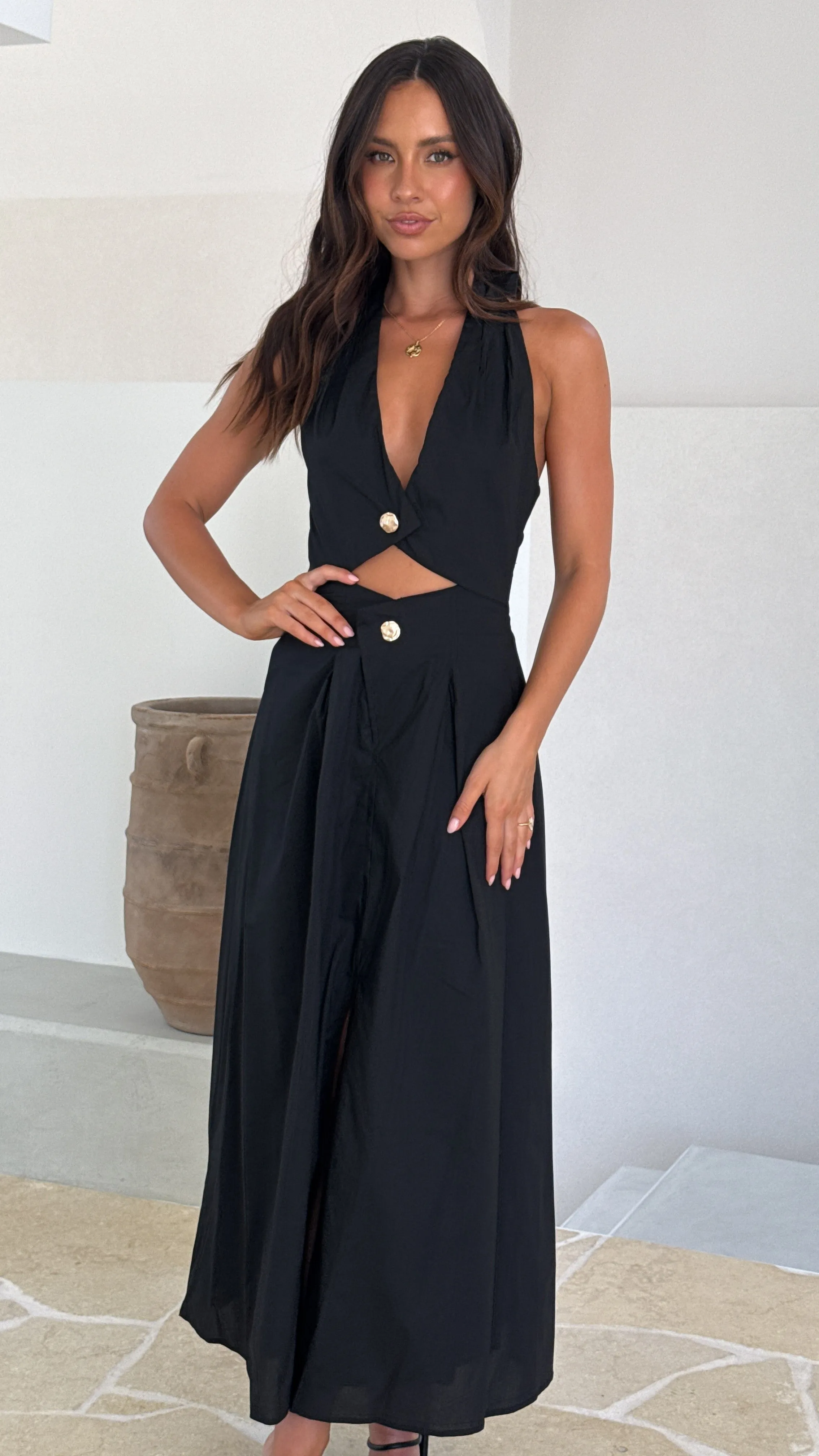 This maxi dress combines classic style with modern comfort for a timeless look Tide Glow Wesley Halter Neck Maxi Dress - Black