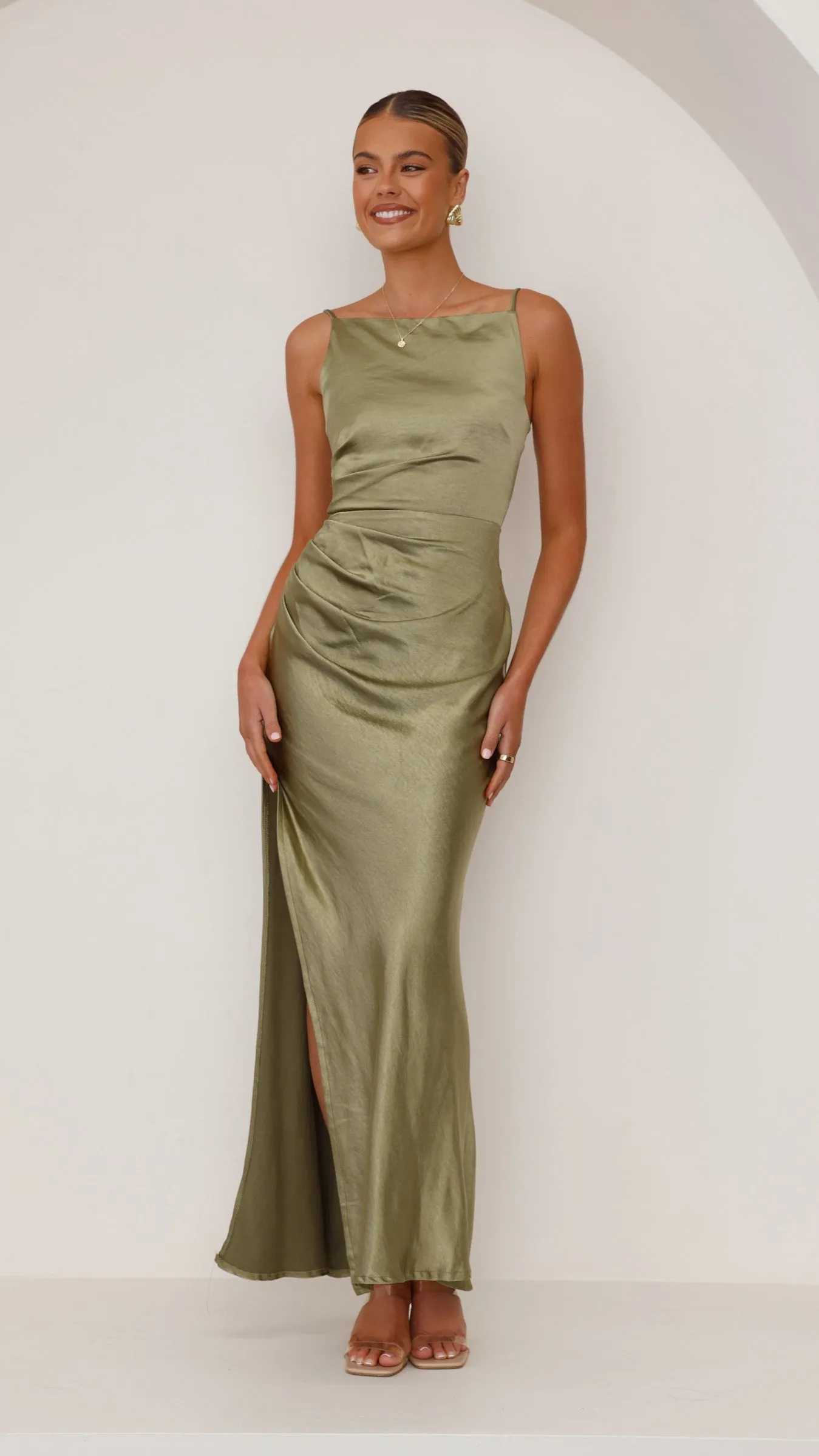 Ava Maxi Dress - Olive Fashion-forward long piece This dress is perfect for transitioning between seasons while still maintaining an elegant look