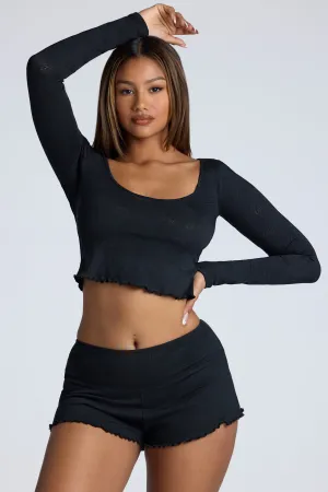Sweat Wicking Fabric Mid Rise Pointelle Mini Shorts in Black