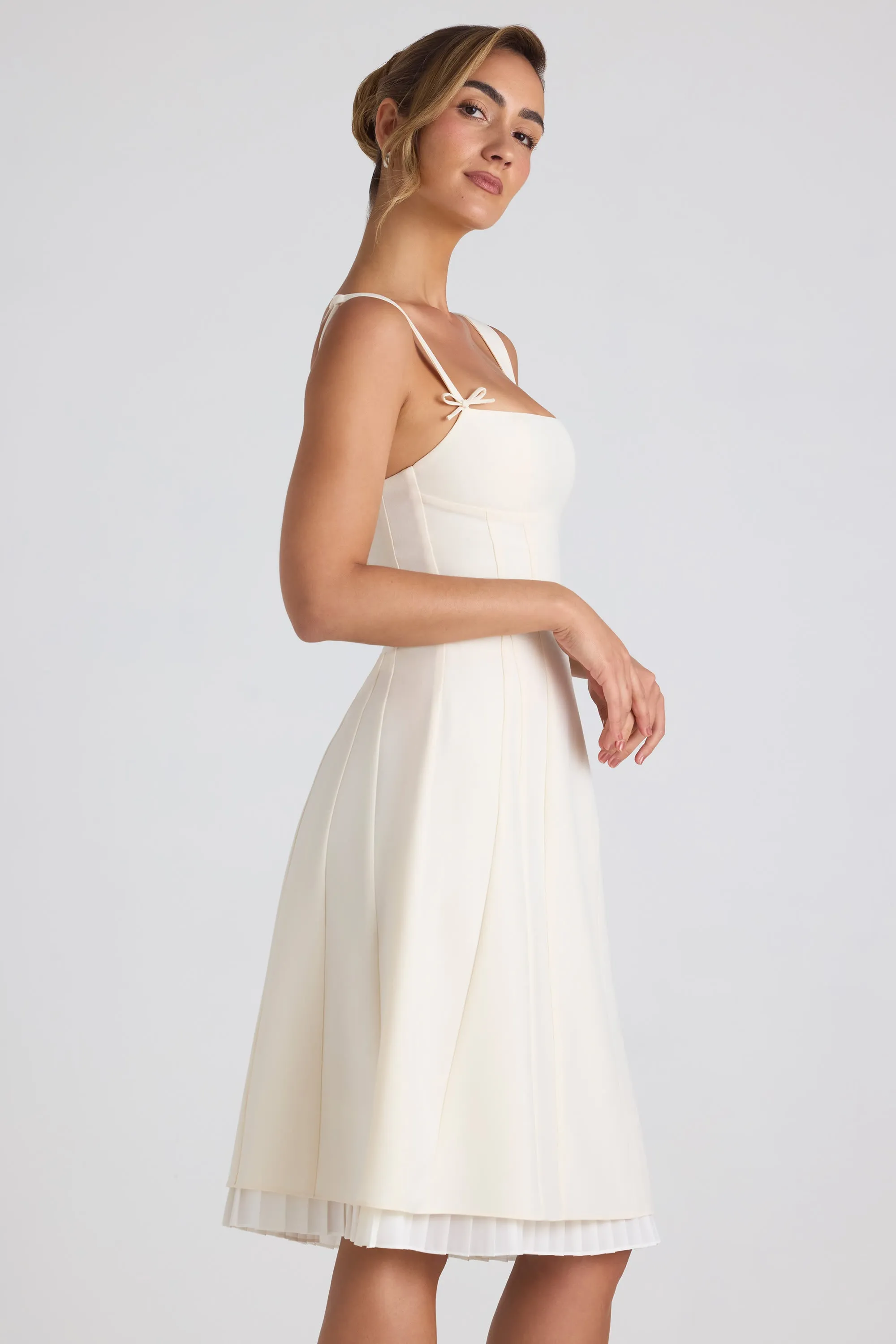 Bow-Detail Pleated A-Line Midi Dress in Ivory Vibrant dress for weekend outing Quick Layer
