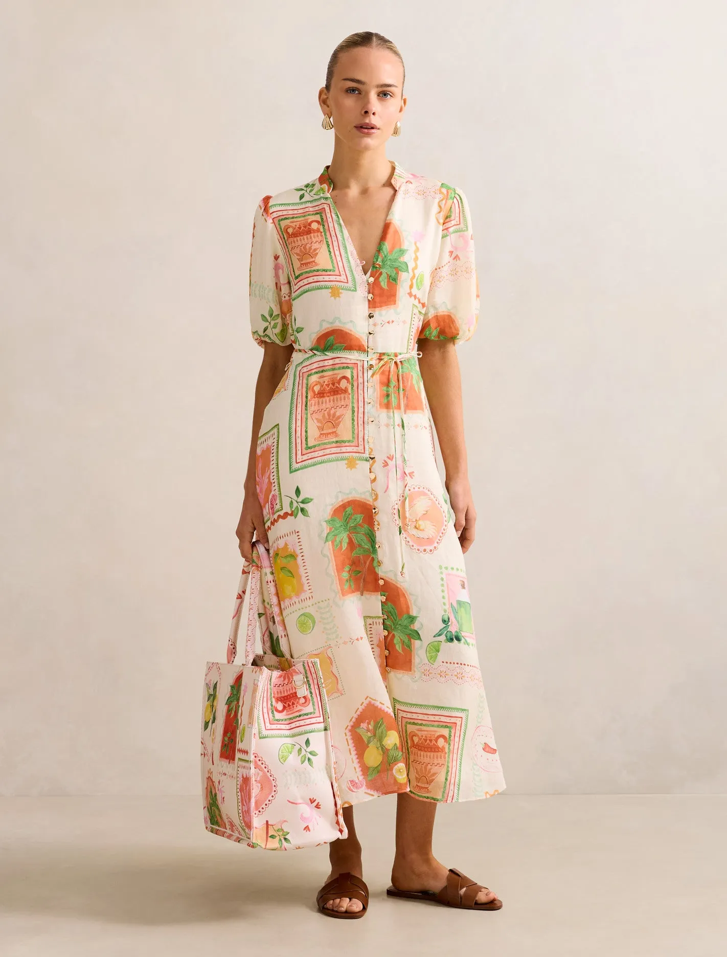 Playful and feminine dress Feminine Elegance Sophie Puff Sleeve Midi Dress