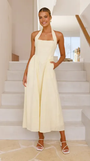 Caden Maxi Dress - Lemon Feminine flowing piece This dress is the perfect addition to any wardrobe for those who value both style and comfort