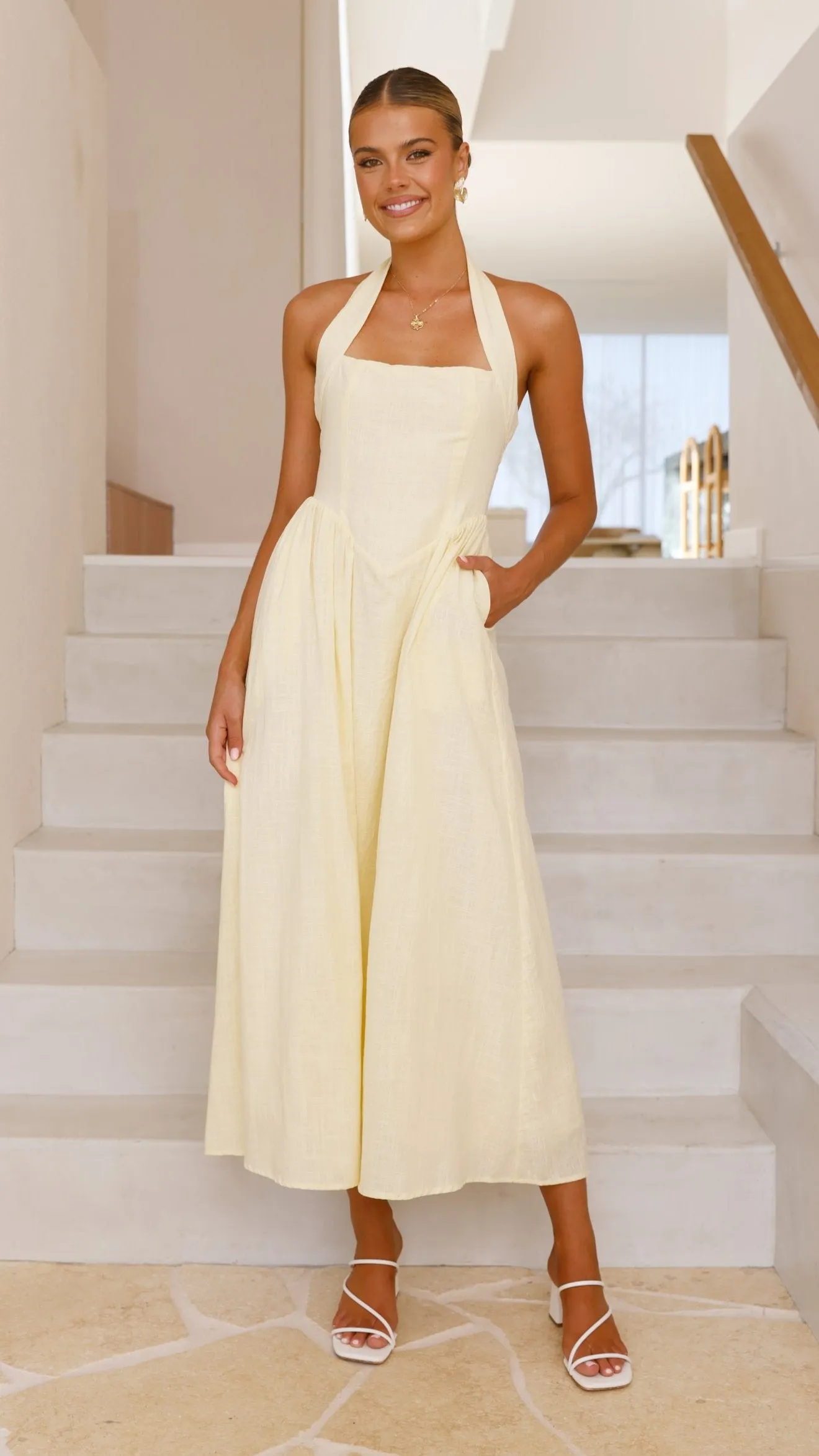 Caden Maxi Dress - Lemon Feminine flowing piece This dress is the perfect addition to any wardrobe for those who value both style and comfort