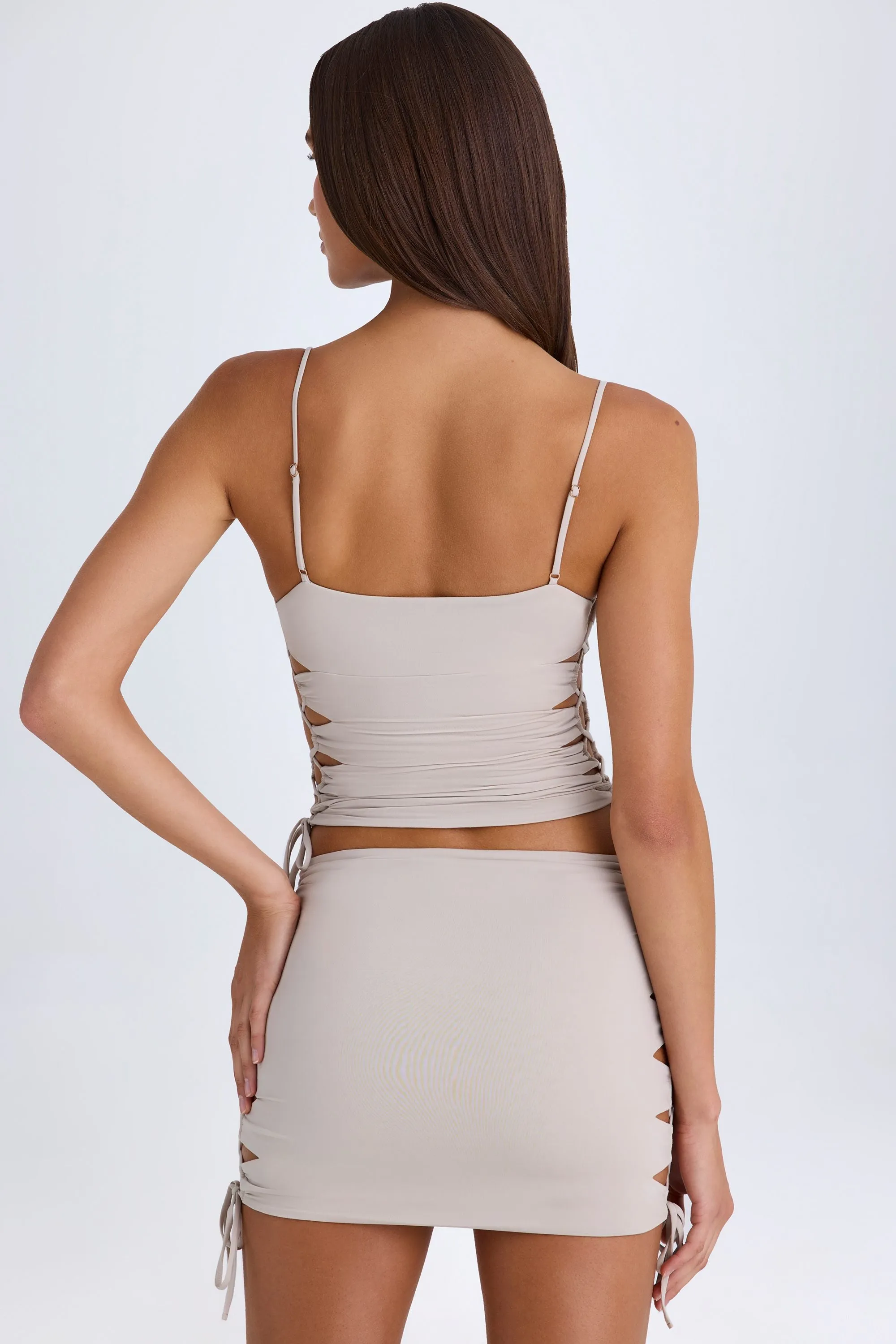 Low Maintenance Fabric Crafted Detail Ruched Cut-Out Mini Skirt in Taupe